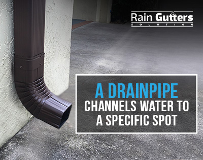 A drainpipe channels water to a specific spot 