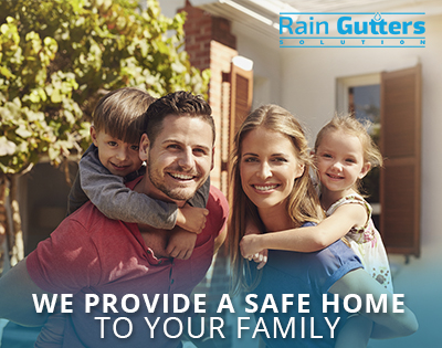 : A Happy Family After a Miami Rain Gutter Company Installed New Rain Gutters on Their Home's Roof