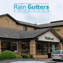 Facade of Commercial Establishment with a Rain Gutters System 