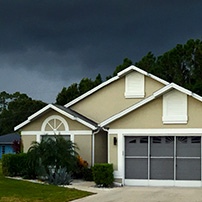 Rain Gutter Cleaning House on Thunderstorm 