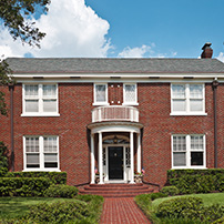 Traditional American House with a Rain Gutter Installation