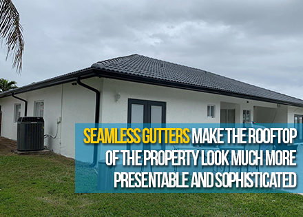 House with Black Seamless Rain Gutters System