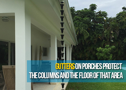 Seamless Gutters and Rain Chains Installed on a Porch