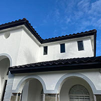 Two-Story House With Rain Gutters