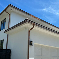 White House with Copper Gutter System Turning Green