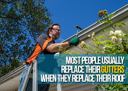 Man Installing Rain Gutters in a House