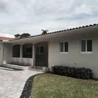 Seamles Rain Gutters on a House