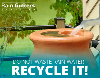 A Rain Gutter Installation Can Help you Harvest Rainwater : A Barrel Getting Rainwater After a Rain Gutter Installation