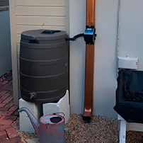 Rain Gutter Barrel Collection System and Downspout