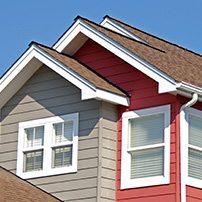 House roof top with custom rain gutters 